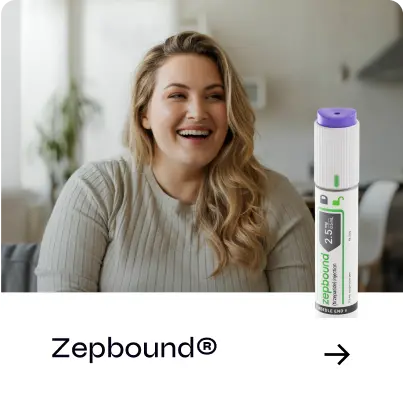 Woman smiling with a pen of Zepbound